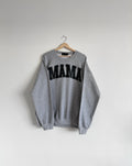 Grey sweatshirt with 'MAMA' text on a hanger against a white background, mama, collab, mother, cozy, matching sweater, allie and sam, gift ideas
