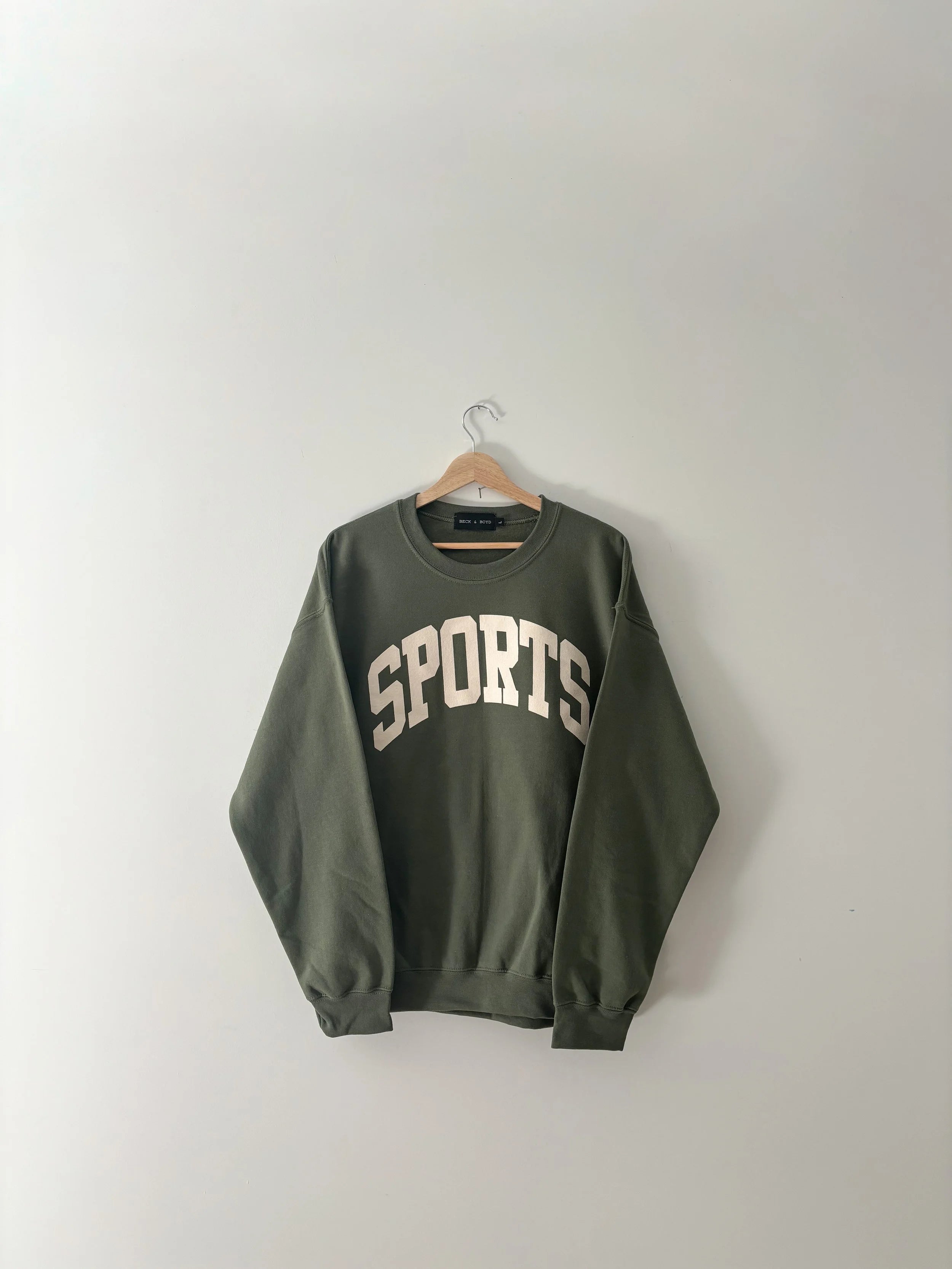 SPORTS Sweatshirt, Beige on green