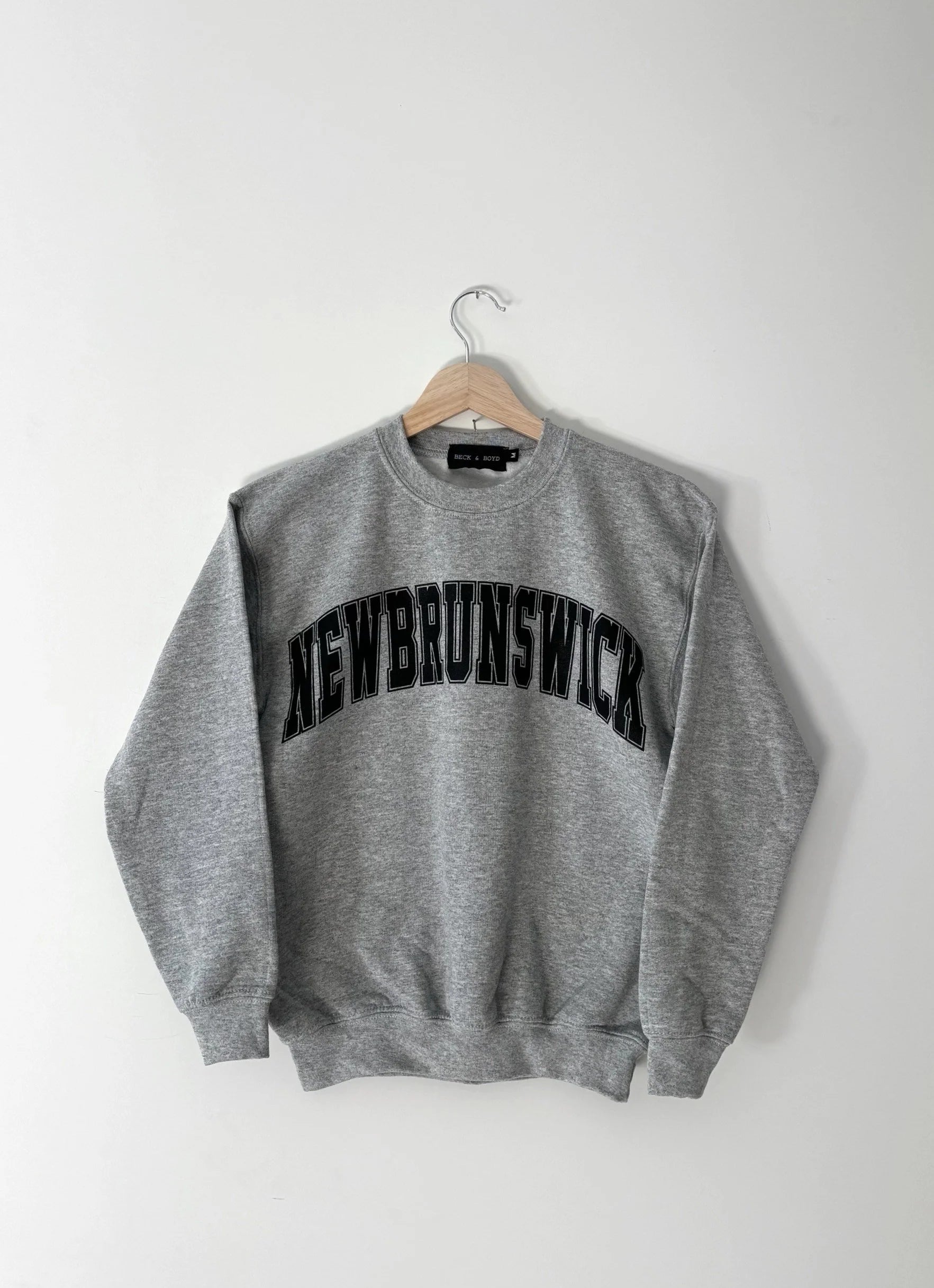 Grey sweatshirt with 'NEW BRUNSWICK' text on a white background, NB, New Brunswick, kids, Kids sweater, matching, cozy, maritimes