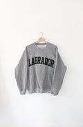 Grey sweatshirt with 'LABRADOR' text on a white background, labrador, atlantic provinces, maritimes, gift ideas, cozy