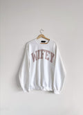 White sweatshirt with 'WIFEY' text on a hanger against a white background, newly wed, fiancee, wedding gift, wedding, cozy